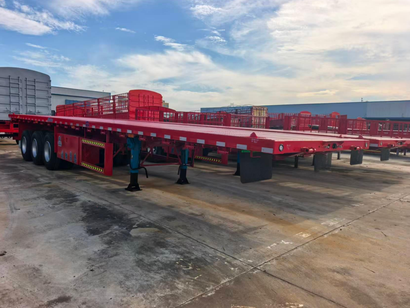 Fabbrica Custom 12,5 Meter 3-Axle Straight Beam Flatbed Semi-trailer Heavy-Duty Container Cargo Transport Trailer in vendita